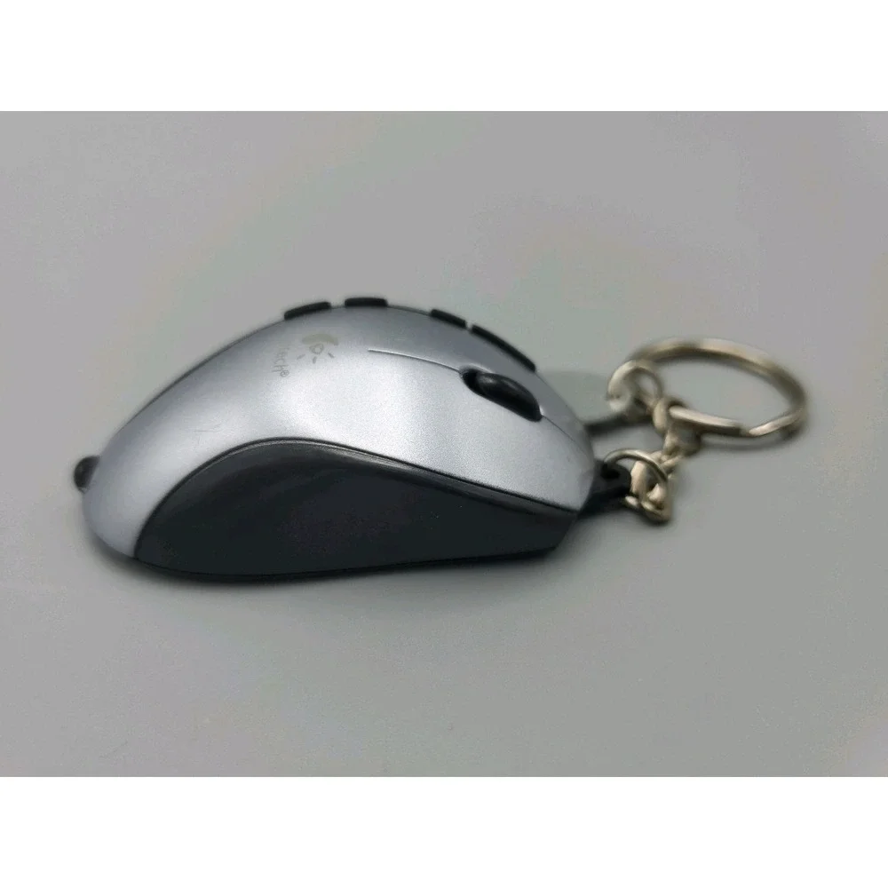 Vintage Logitech‎ Mouse Keychain Light Advert 25th Anniversary Nostalgia
